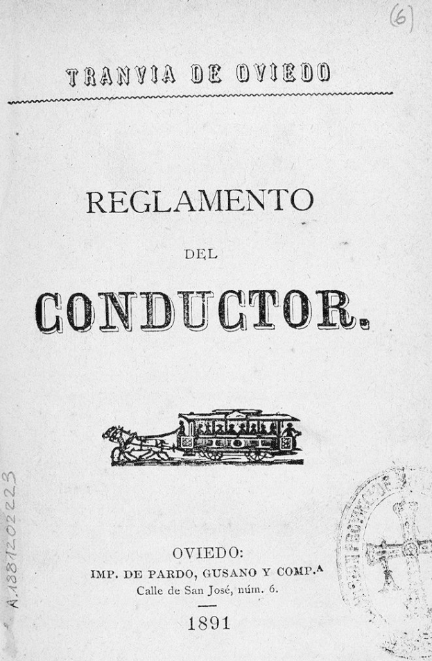 Altes Buch mit dem Titel "Reglamento de Conductor" und einer Zugillustration auf dem Titelbild und einem Stempel auf der rechten Seite.