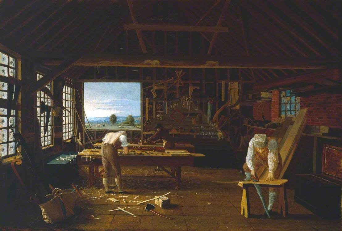 Gemälde mit dem Titel "Die Schreinerwerkstatt" von William Hogarth, das zwei Männer bei der Arbeit in einer Werkstatt mit einem Tisch voller Werkzeuge und anderen Gegenständen zeigt, Fenster auf der linken und rechten Seite und eine Hintergrundansicht von Bäumen, Bergen und Himmel.